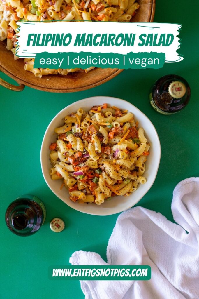 Bowl of Vegan Filipino-Style Macaroni Salad with vegetables, pineapple, and plant-based hot dogs.